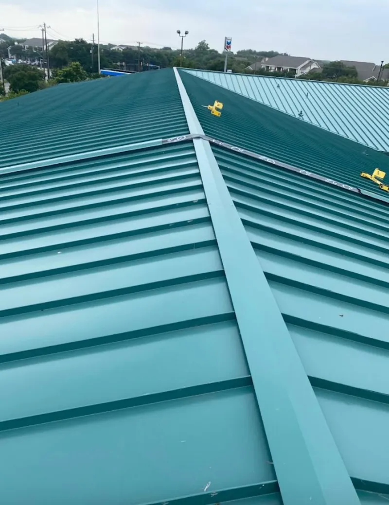 Green commercial metal roof ridge and valley for Metal Roof Repair in Northgate